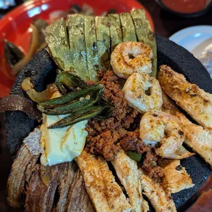 Molcajete Mexicano!  So full of many flavors and absolutely a reason to return. The cactus was cooked perfectly, as was everything else.