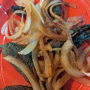 Fried jalapenos and onions which were delicious and went perfectly with the meal.