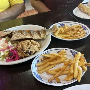 three plates of food on a table