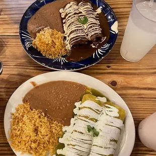 Blue plate- Enchiladas de Mole White plate- enchiladas verdes con extra crema (green salsa enchiladas with extra sour cream)