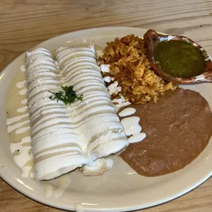 Chicken enchiladas with white queso $13