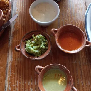Queso, Guacamole and Red and Green salsas and chips