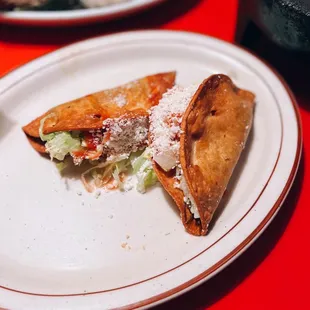 Hard tacos (one chicken, one beef) / $6.24