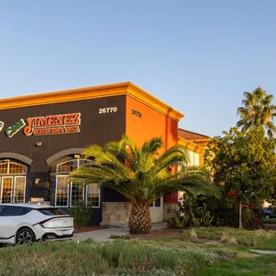 Outside of the restaurant October 2024 with the new banners