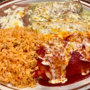 a plate of enchiladas and rice