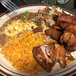 a plate of mexican food on a table