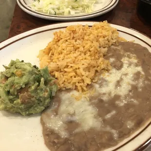 My side of rice and beans for my molcajete with corn tortillas.