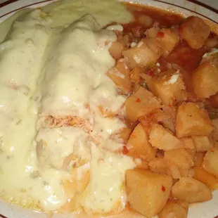 Chicken enchiladas with Mexican potatoes!