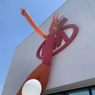 Casa Kia's king inflatable tube guy