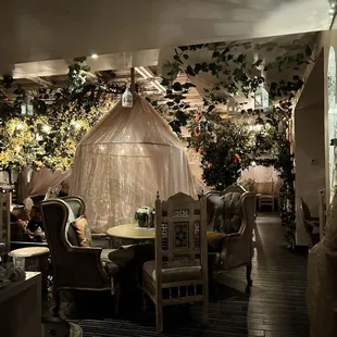 a dining room with a canopy