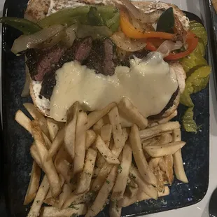 Steak sandwich - very good fries. A bit too much sauce for me on top, but very tasty and well cooked steak!