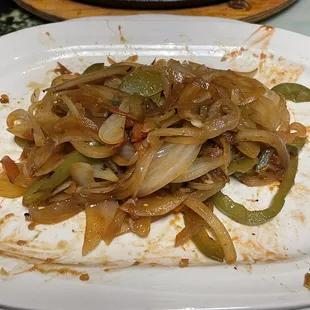 All the onions and peppers I took out of the fajitas.