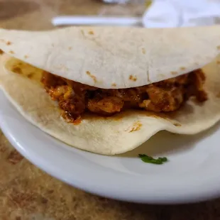 Queso Fundido with Chorizo filled tortilla, the best way to eat it.