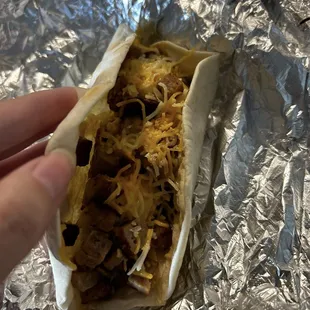 Sausage and cheese breakfast taco