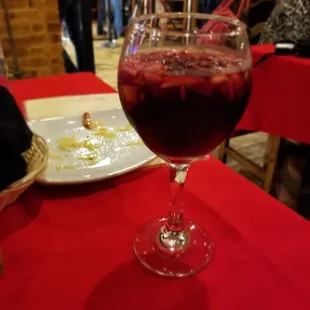 a glass of wine on a table