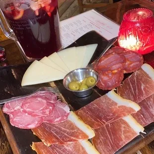 Monchego cheese, Serrano ham, chorizo blanco, chorizo Soria, and anchovy stuffed olives.  Absolutely delish!