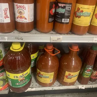 Hot sauce in large jugs