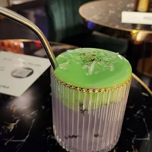 a cupcake with a spoon sticking out of it