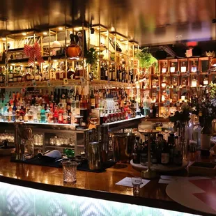 a bar filled with liquor bottles