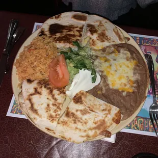 shredded chicken quesadillas with rice and beans