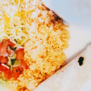 a burrito, rice and salsa