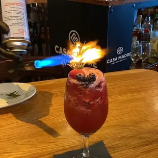 Berry Gin topped with fresh rosemary