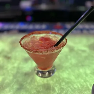 Pink Margarita with muddled fresh strawberries, watermelon, lime juice agave and tequila of course