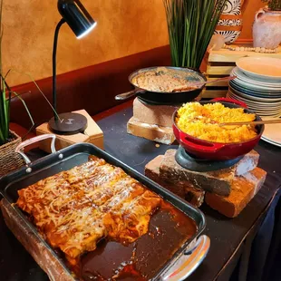 enchiladas and rice and beans