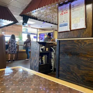 Backside of the bar and the entrance from the inside.