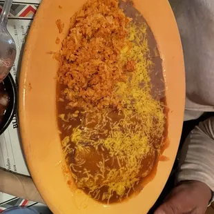 Supposed to be a ground beef and cheese enchilada. Was two ground beef. Though yummy.