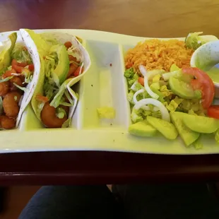 Fried shrimp tacos with a cream sauce that&apos;s delicious
