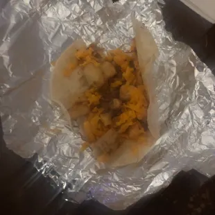 Bean potato cheese on flour tortilla. Tortilla is rock hard, hardly any beans but they&apos;re cold anyway. Potatoes are ice cold.