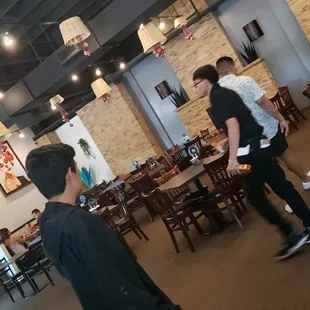 two men playing a video game