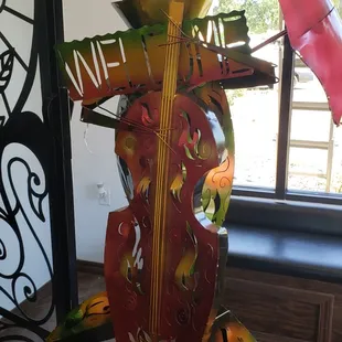 a sculpture of a violin and a guitar