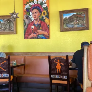 a man sitting at a table in a mexican restaurant