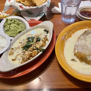 Guacamole, sour cream, chili rellano, chicken-spinach-sour cream sauce.