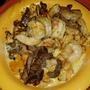 Sky, Surf &amp; Turf. My sons favorite at our home restaurant. The cheese sauce was light and yum! There was tons of shrimp!