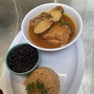 Chicken and potatoes soup with side black beans