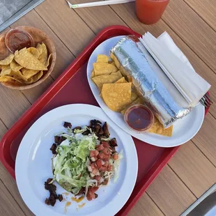 Chorizo burrito and Al pastor super taco