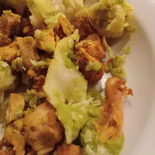 Enchiladas with dried-out chicken bits &amp; raw tortillas.