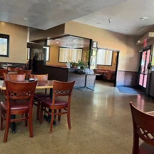 Spacious seating, and a bar and dinning area in the back for larger events.