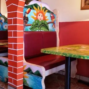 Colorful booths and furniture.