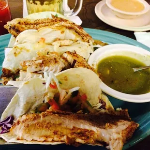Baja fish tacos, grilled not fried. Request chipotle sauce on the side to add to it.