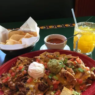 My current situation that I am very pleased about. This is the Deluxe Nachos with chorizo (Mexican sausage) and "real" chicken.