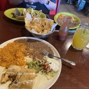 a plate of mexican food on a table