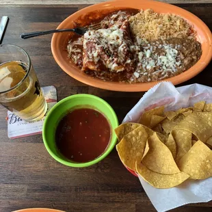 Chips and an enchilada entree.