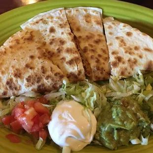 Half Chicken quesadilla from the appetizer menu.