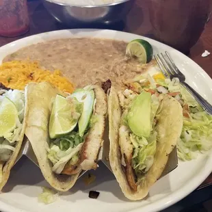 Fish tacos, beans and rice. Yummy!