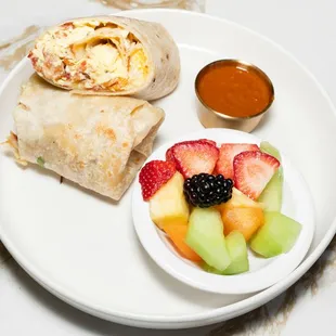 Bacon Burrito 
Bacon, scrambled egg, mixed cheese, hash brown and a side of house made salsa.
