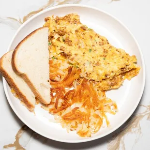 Chorizo Omelette
Filled with crumbled Mexican chorizo, onions, jalapeño, avocado and mixed cheese.